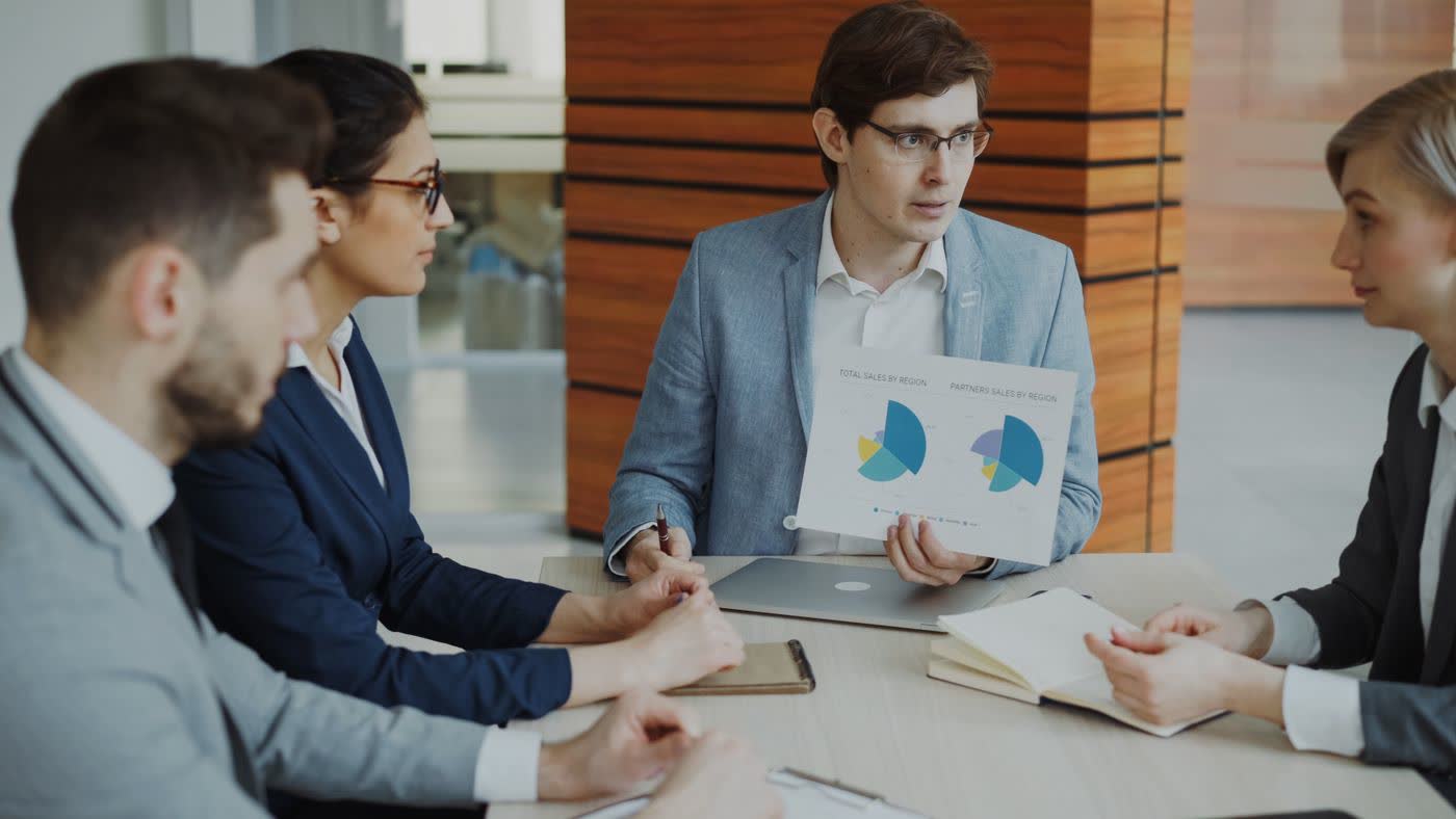 Team reviewing financial charts in a meeting